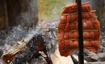 salmon cooking by fire 