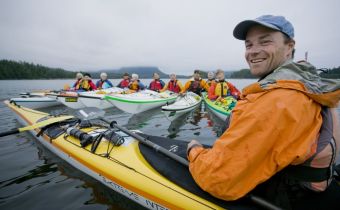 West Coast Expeditions owner Dave Pinel with a women's group kayaking