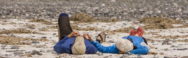 Andrew Findlay & Lisa Relaxing on Lookout Island While Kayaking Kyuquot Sound
